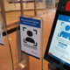 View of the biometric facial recognition system in front of a security checkpoint in the departure area of Hamburg Airport.